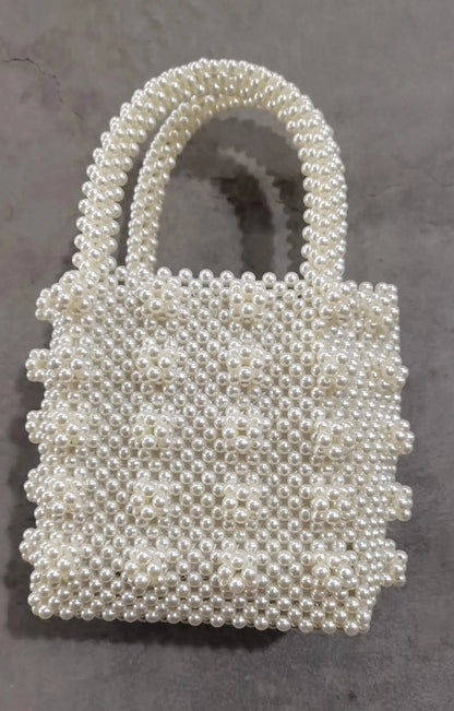 Pearl woven dinner bag Angel Wishes